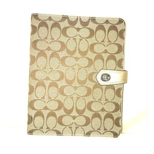 COACH: Signature iPad cover.